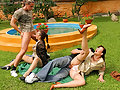 Fully clothed babes fucking and getting pissed on