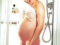 Naughty pregnant babe spreading her pussy and playing with her boobs while taking a shower live